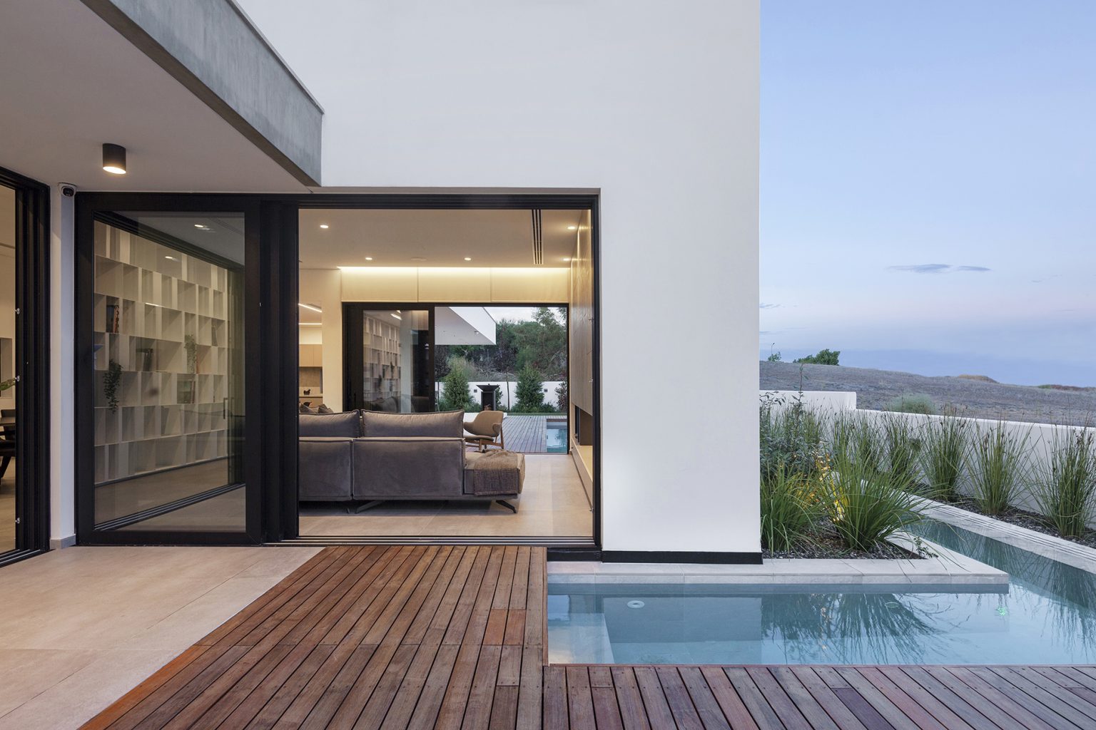 IQONA Architects Reimagine Hillside Residence into a Contemporary ...